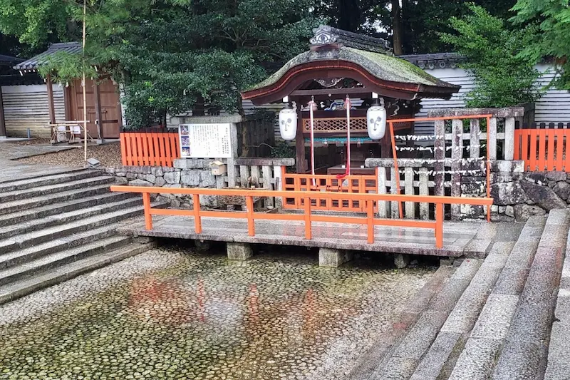Mitarai Pond and the small shrine pavilion at Shimogamo Shrine, Kyoto, used for purification rituals and the Mitarashi Festival